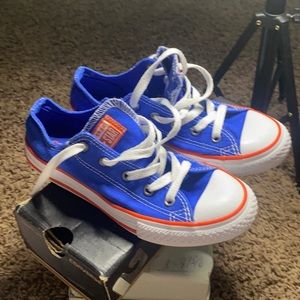 Blue and orange low converse the kids size to